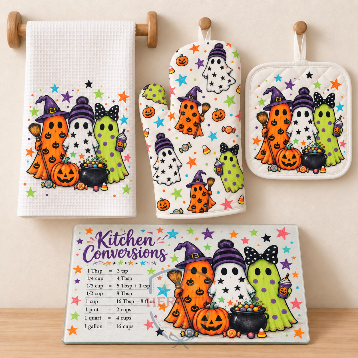 Colorful ghost kitchen set — towel, oven mitt, pot holder, and matching cutting board