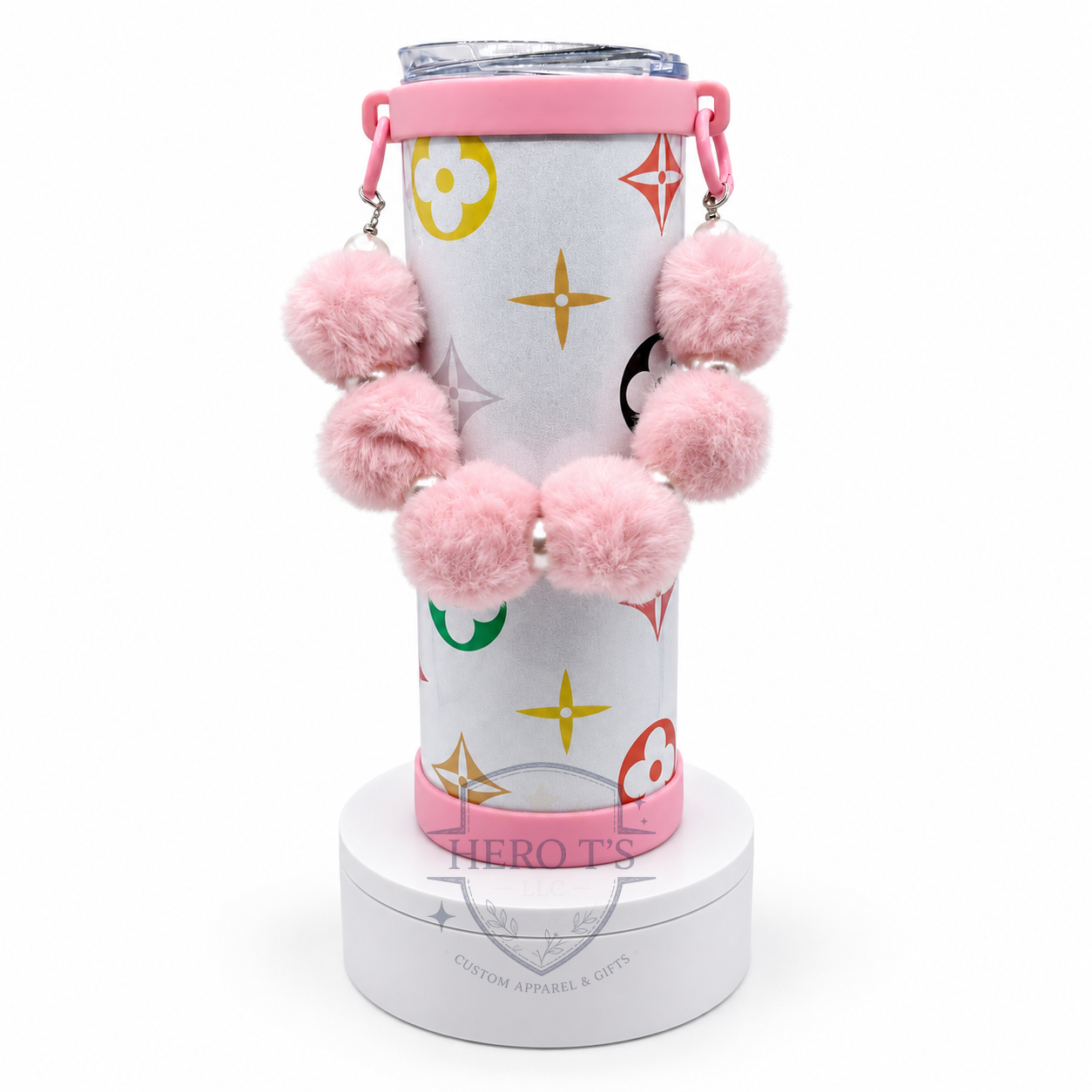 Silver and pink custom tumbler with pom-pom strap